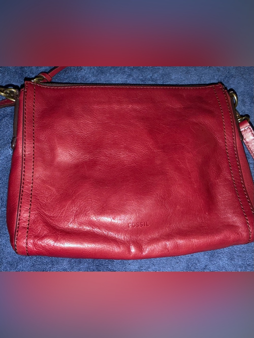 Fossil “Emma”red leather crossbody bag with contrast stitching.